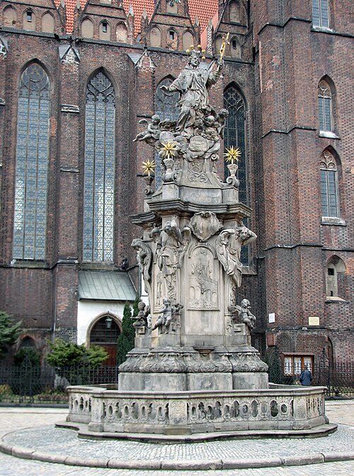 Monument of John of Nepomuk and church of the Holy Cross in Wrocław